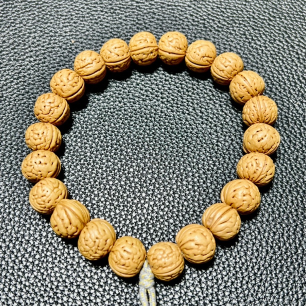 盘锦纽扣嫁接桃核模仿来水桃核微抛光打底男女通用可盘玩手把件