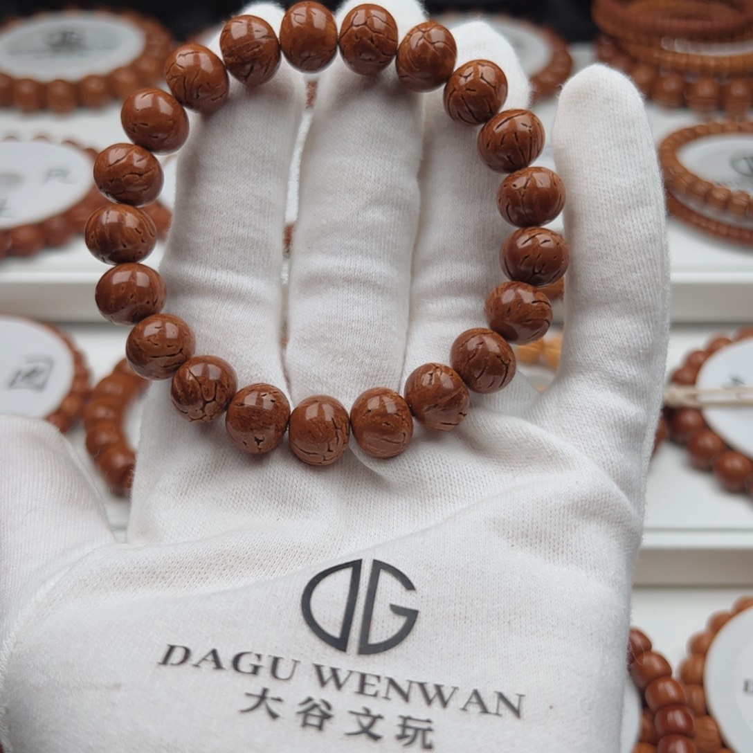 桔***.吊坠桃核桃核手串