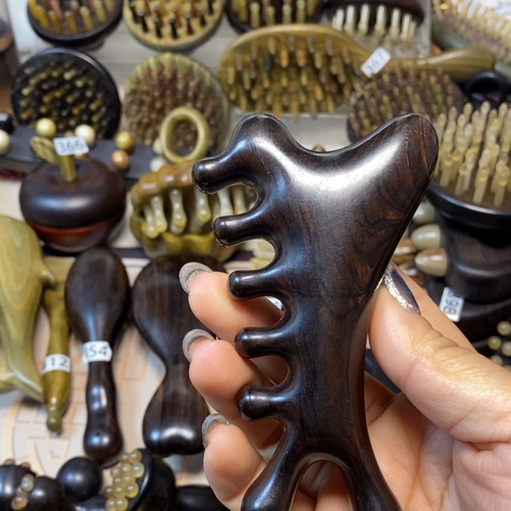 紫光檀四合一按摩梳