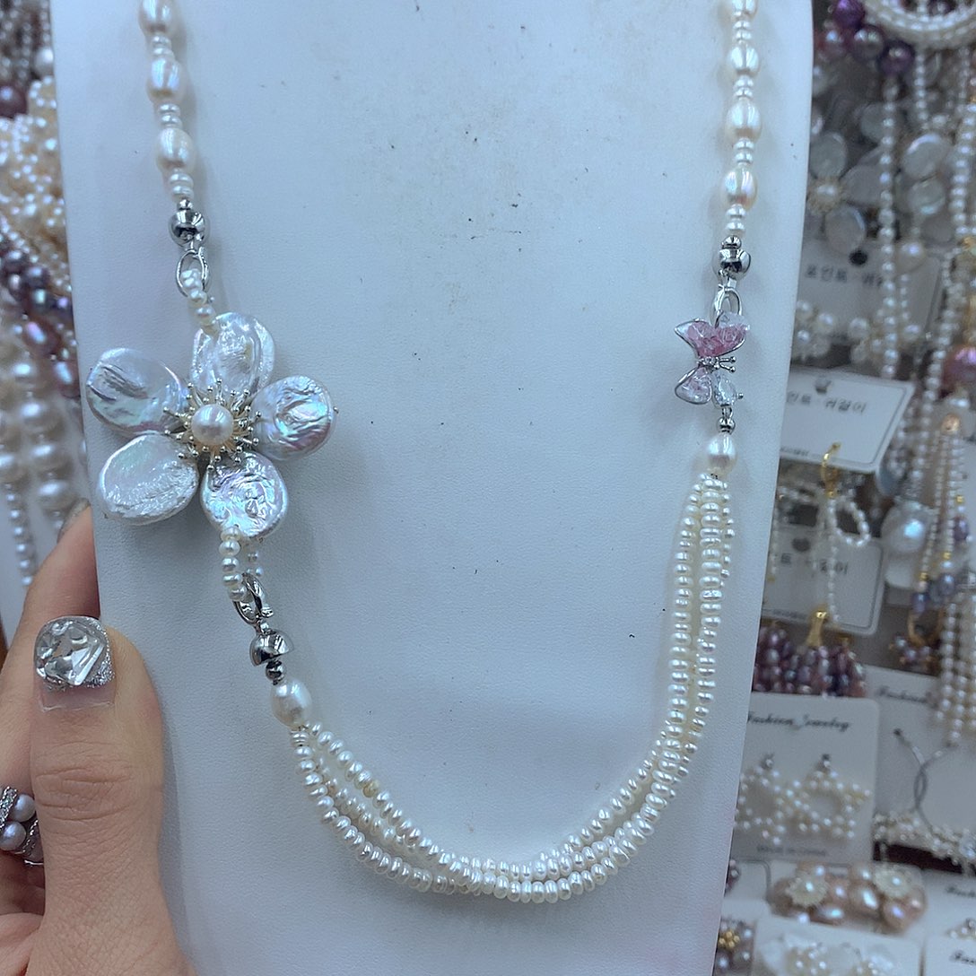 梓***婷淡水珍珠耳饰银S925镶嵌