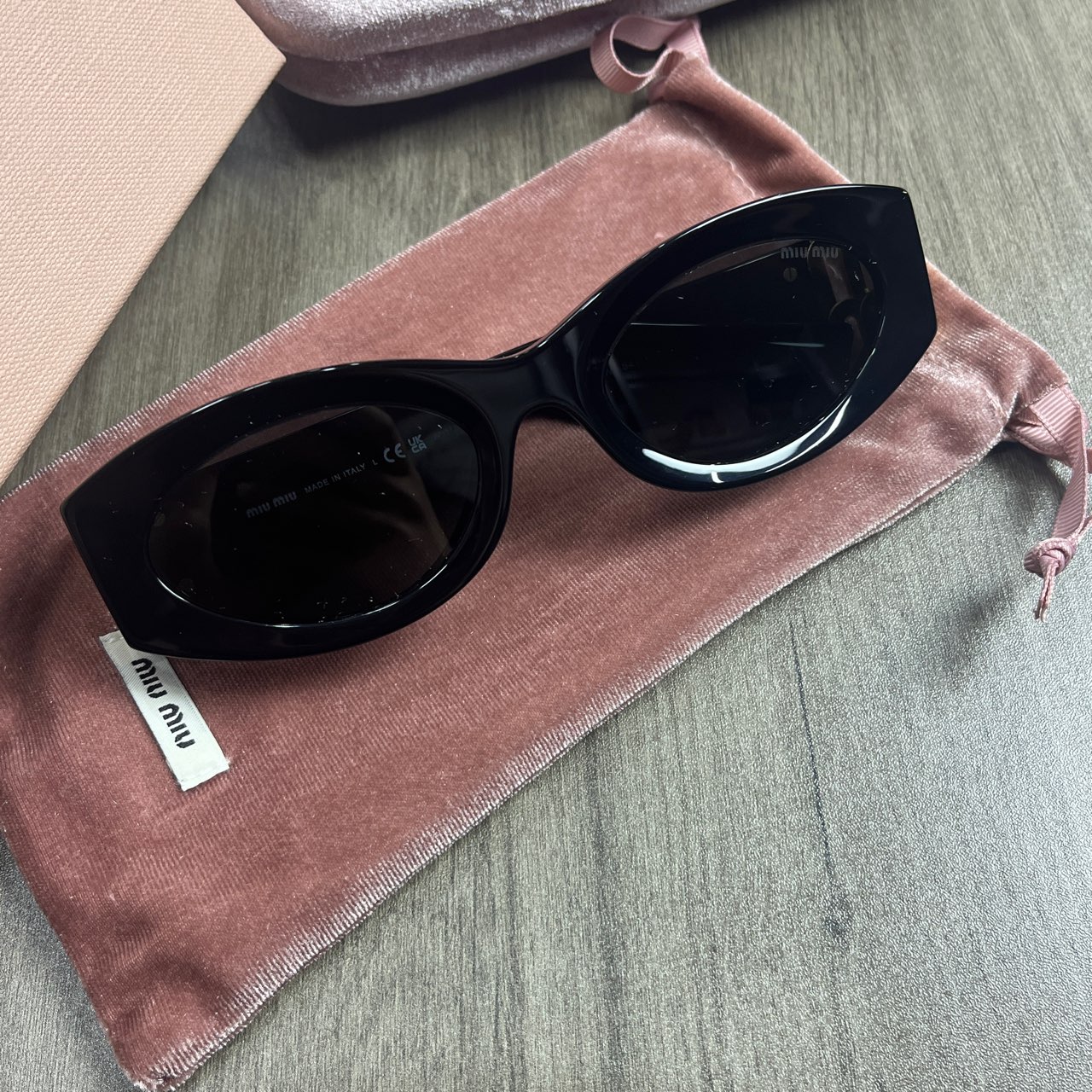 全新未使用 MIU MIU/缪缪 黑金猫眼墨镜 miumiu11W