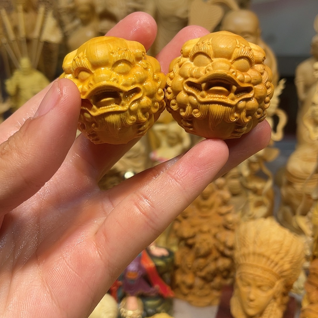黄杨木瑕疵貔貅一对