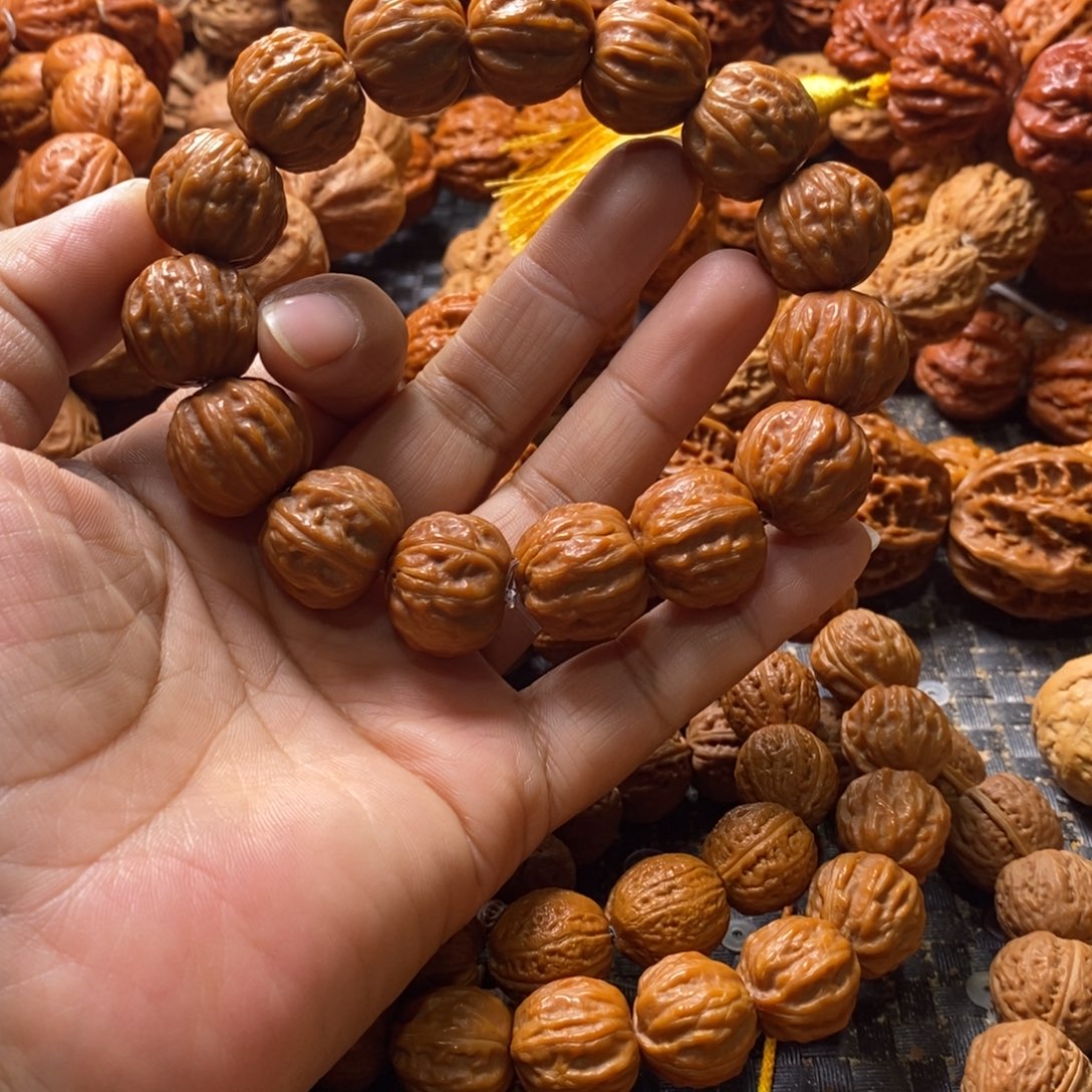 罗***罗文玩核桃吊坠树王