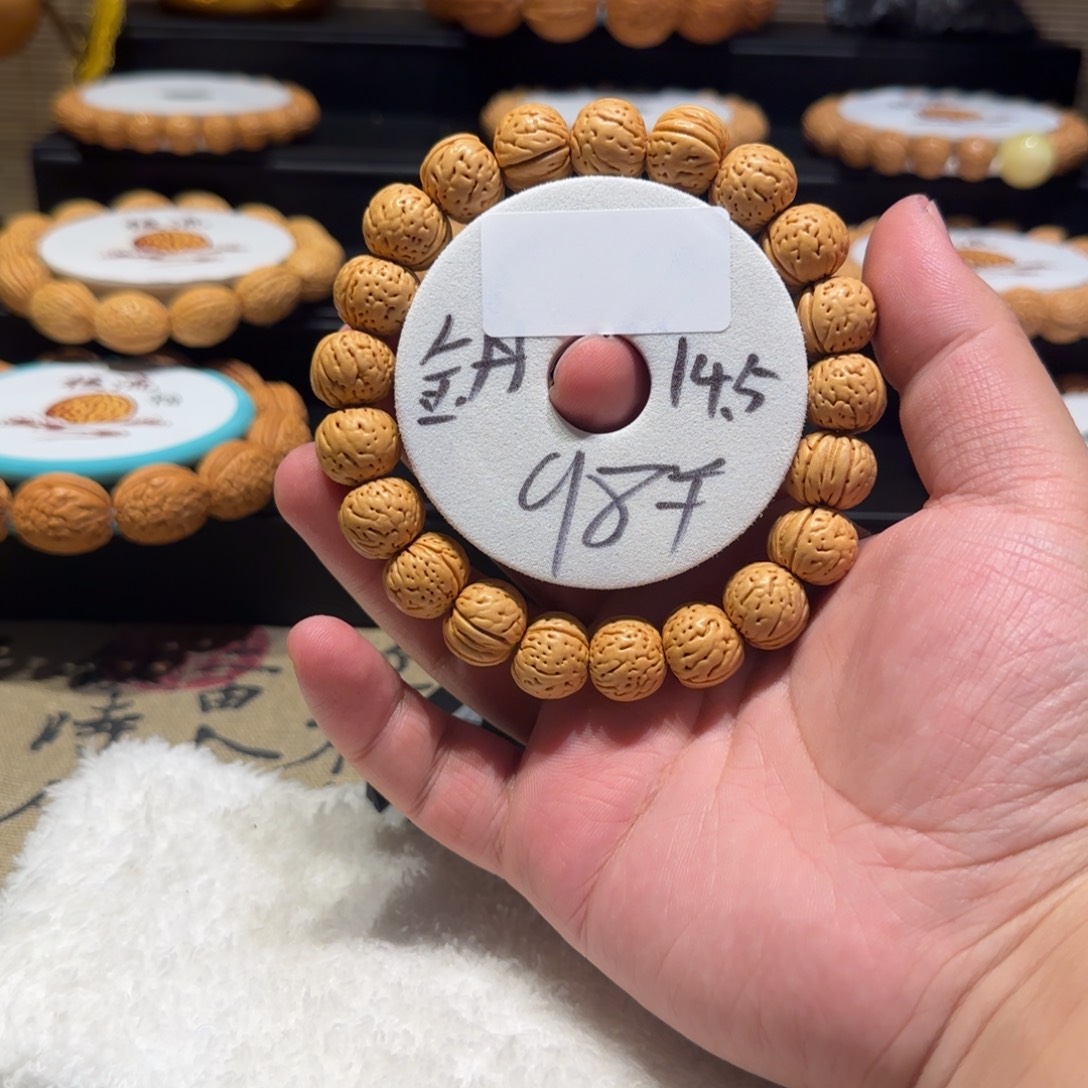 岁***禾桃核吊坠精品桃核