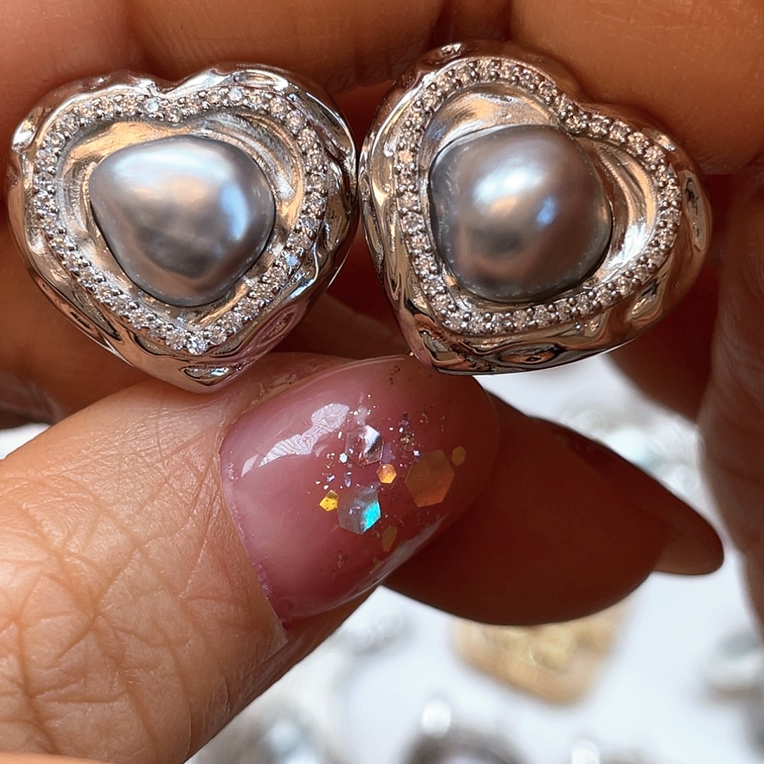 蕙***心耳饰银S925镶嵌海水珍珠