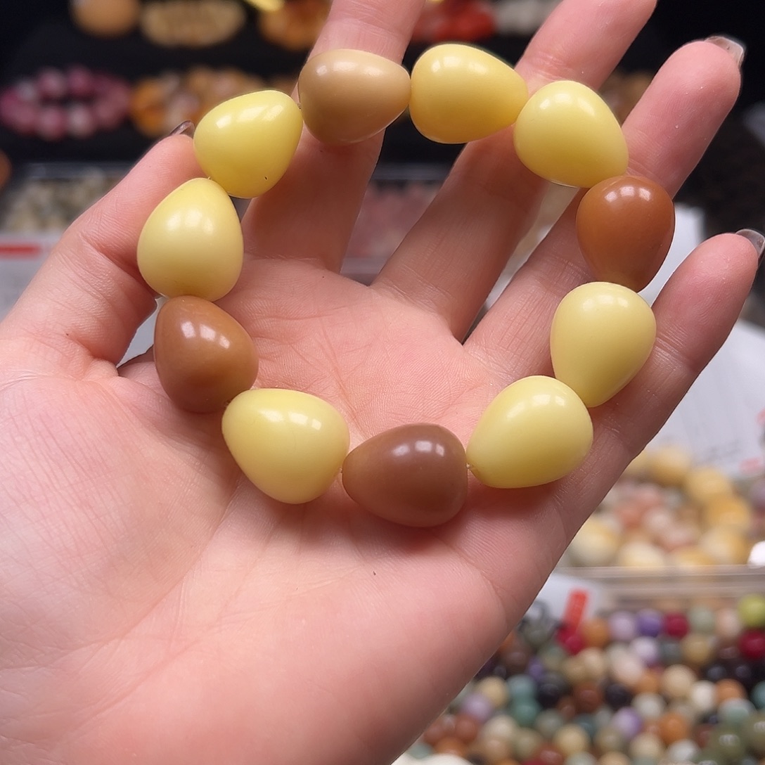 手串菩提根/象牙果19多宝水滴1条