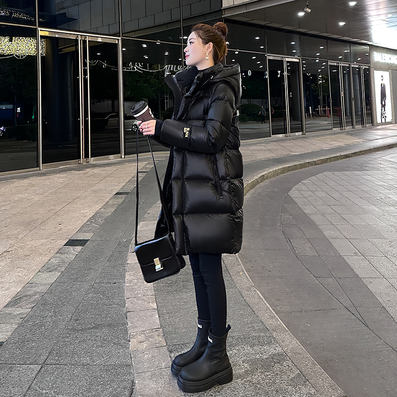 黑色羽绒服女中长款连帽2025冬季新款宽松加厚保暖东北防寒外套潮