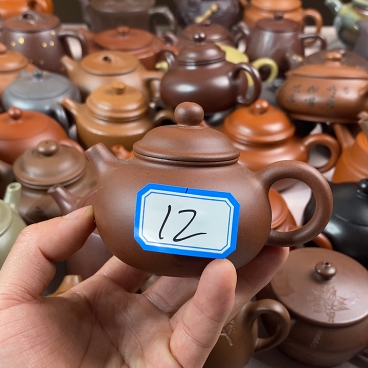 紫砂茶壶左****℃宜兴紫砂壶