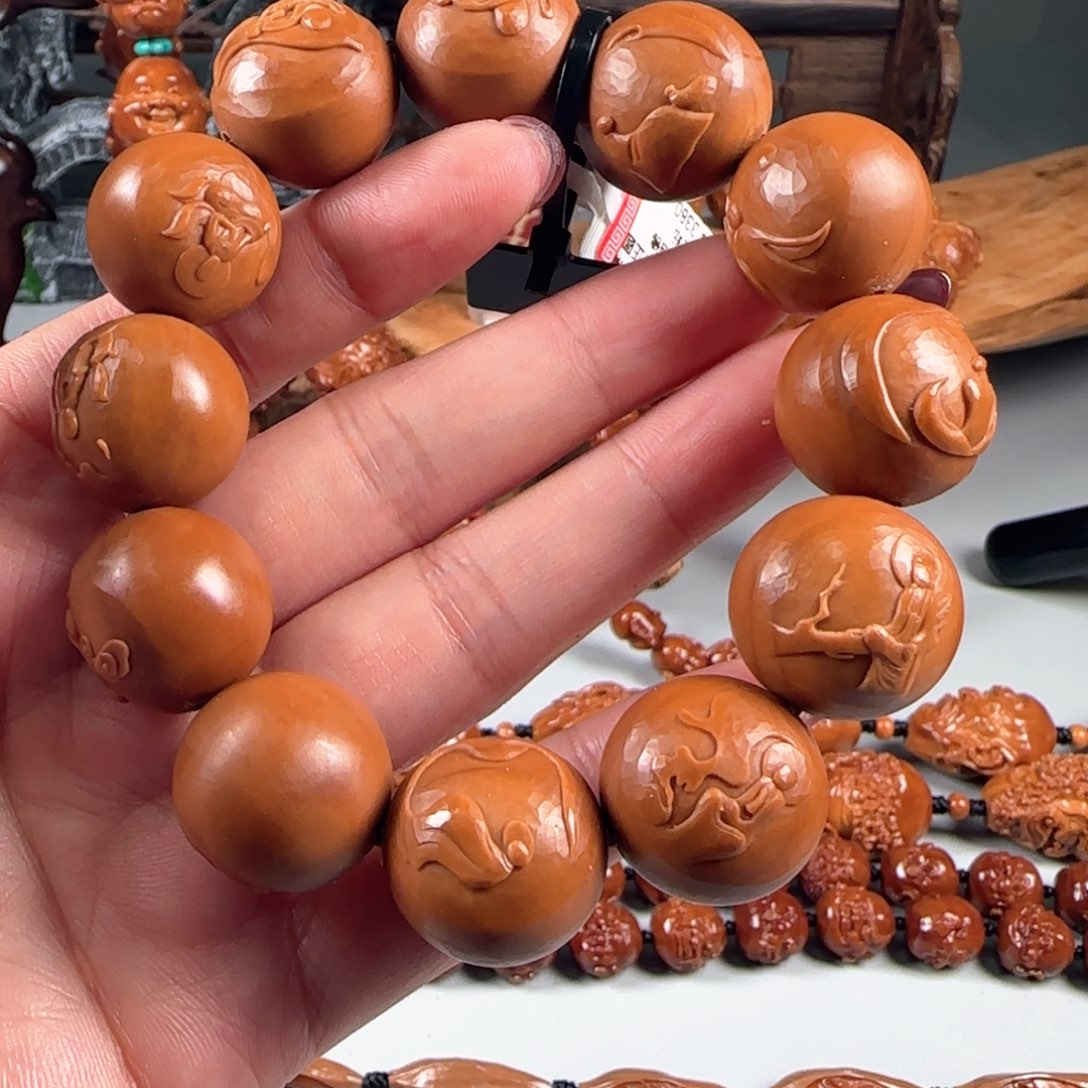 橄榄核手串/手链宽2.0鸡血红梅林核正圆留刀痕无相佛