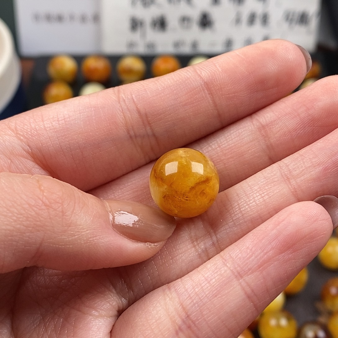 愤***鸟琥珀未镶嵌裸石蜜蜡
