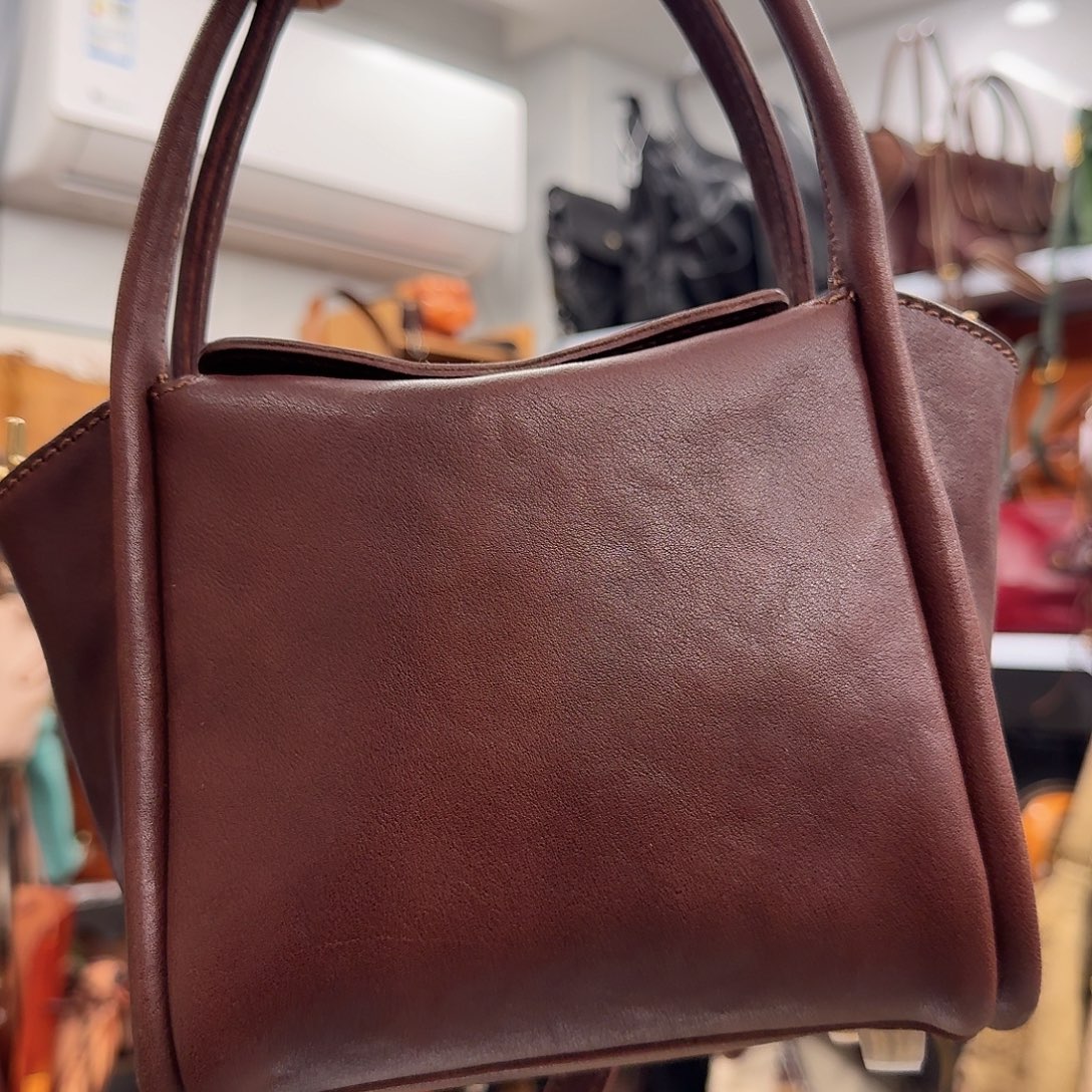 两***啦头层牛皮特价手提