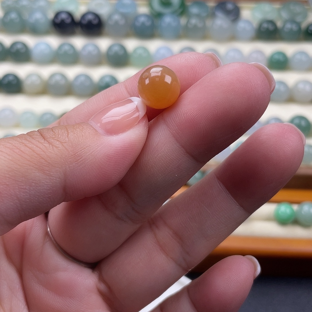 翡翠散珠天然翡翠a货冰橘红卡9.8完美