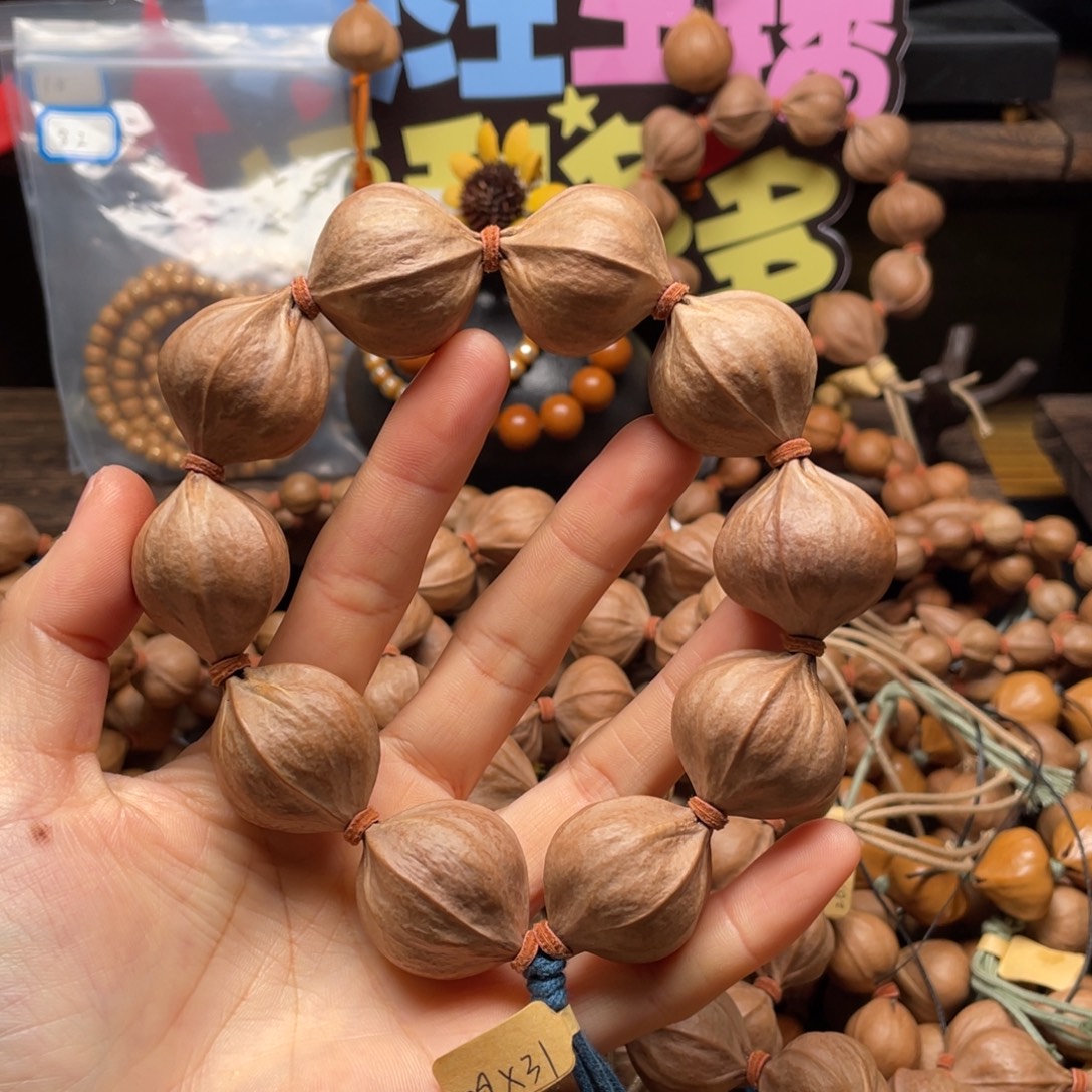 Y***P吊坠橄榄核2931四花铁核