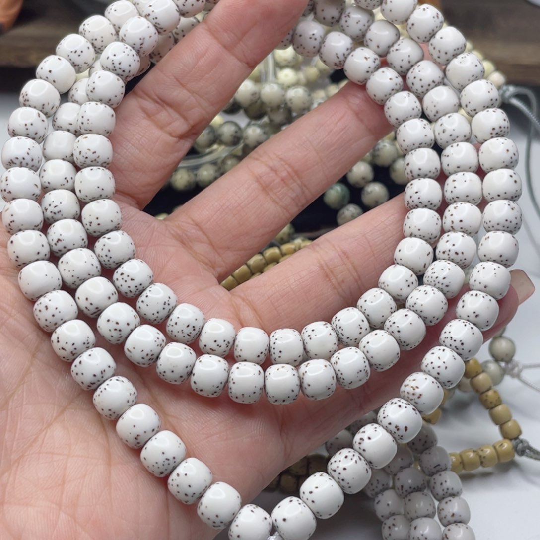 星月菩提吊坠?****乡8+ 顺白河豚半臂江山毕业串