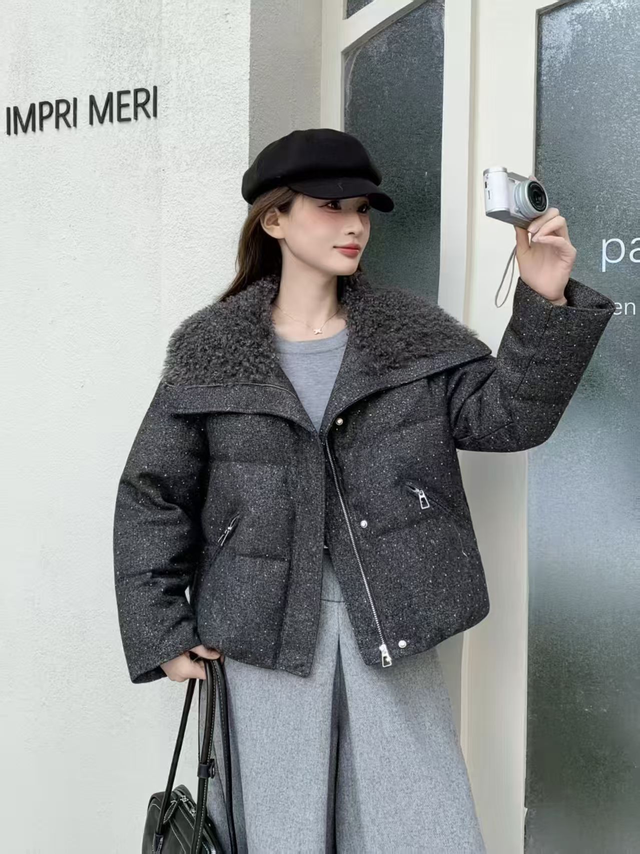 欧洲站乌衣轩冬季新款时尚高档烫钻羽绒服女