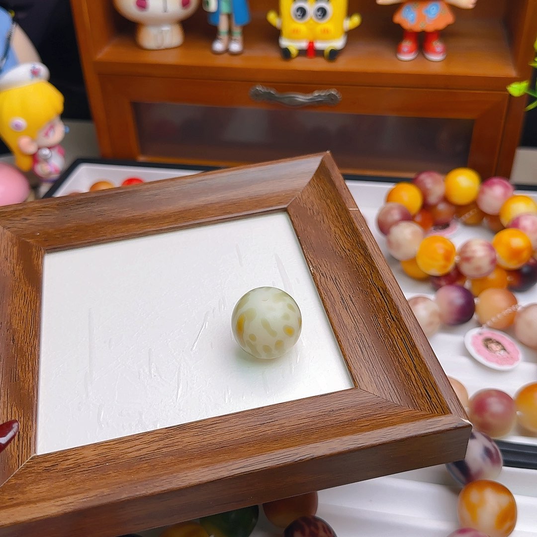 妞***菩提根/象牙果手串一颗