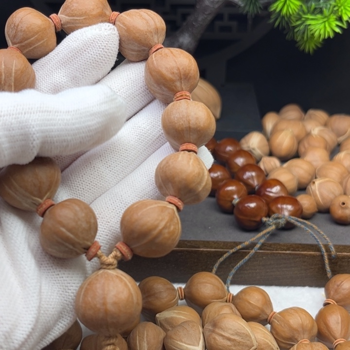 奋***斗橄榄核手串/手链2.0*2.0原皮三花铁核12颗