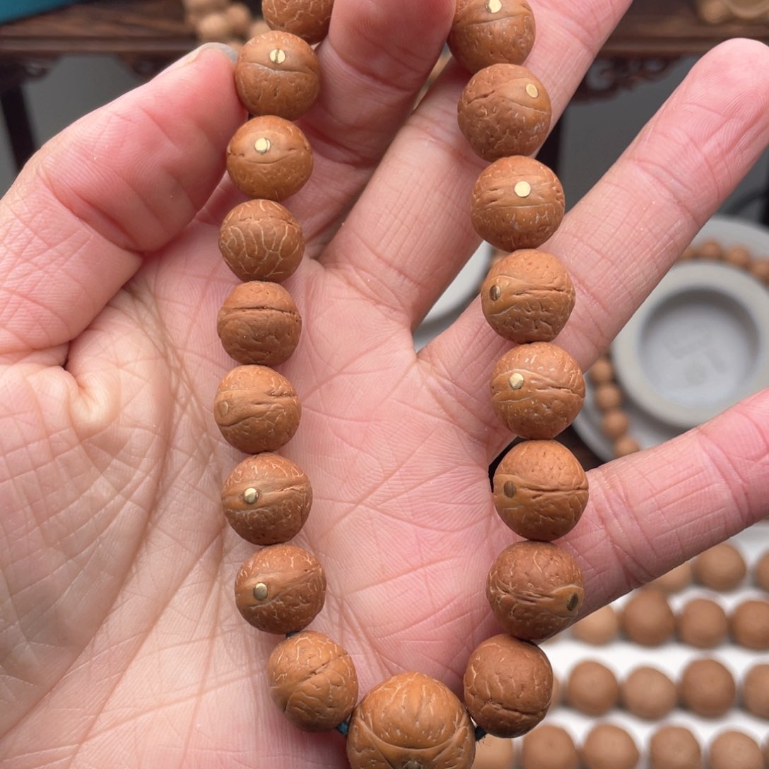 麒麟眼菩提手串J****S铜钉镶嵌凤眼手串