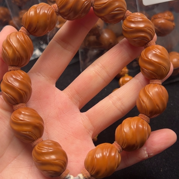 橄榄核吊坠扭转乾坤