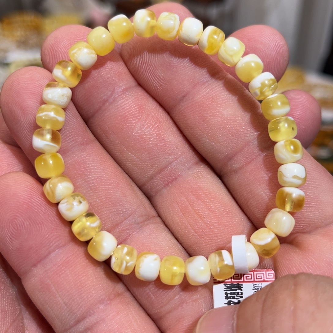 琥珀未镶嵌手链微瑕金漆白荧光溶洞妖花6.3mm