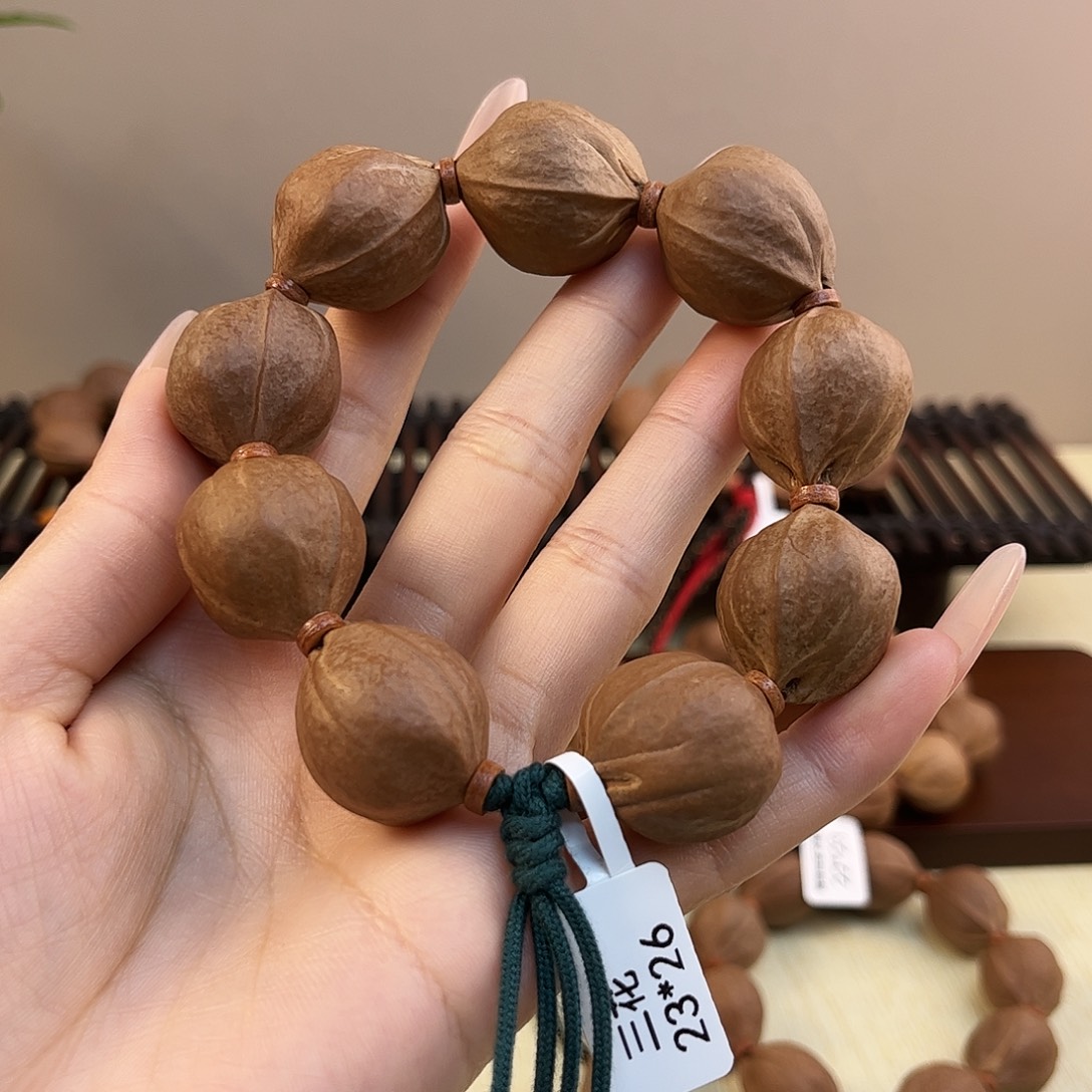 阿***佛橄榄核吊坠梅林铁核文玩手串