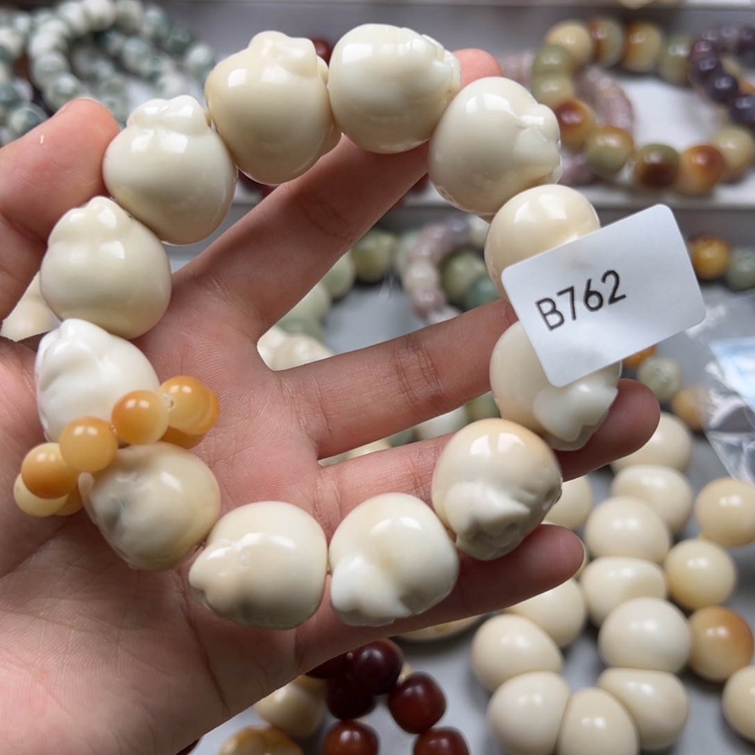 小***常吊坠菩提根/象牙果b762kt23-25微瑕一串