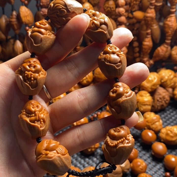 吊坠橄榄核记***笑包衣弥勒
