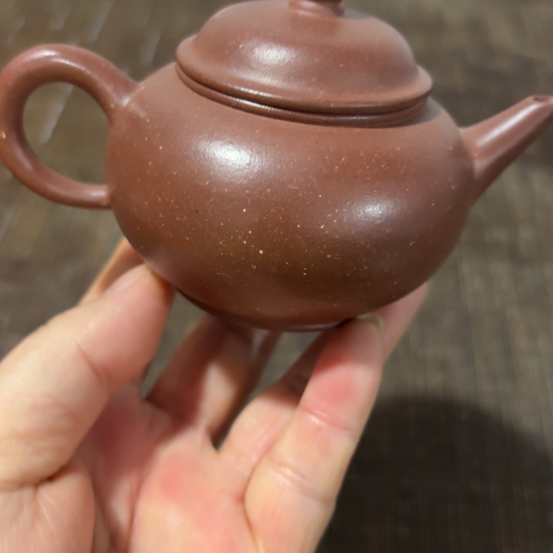 紫砂茶壶紫砂花茶和白莲花都在此相融相伴