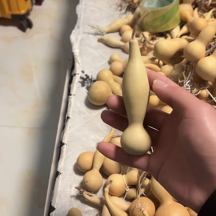 云***合成树脂天然本捻葫芦手把件