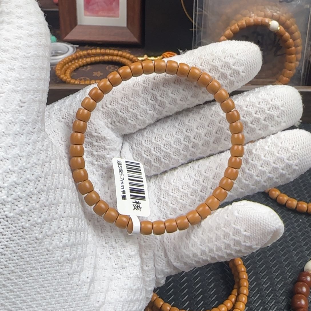 橄榄核吊坠天****5.7mm老挝核尖直切单圈