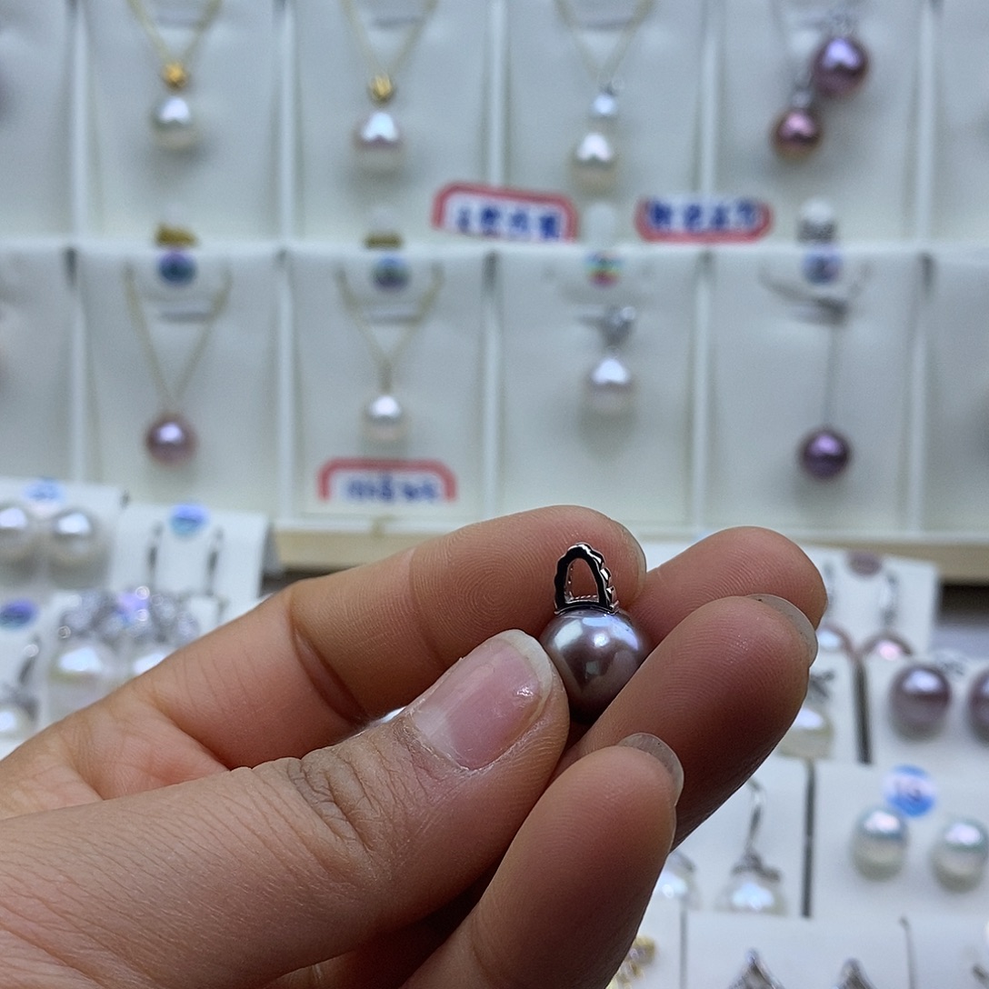 曼***贸银S925镶嵌淡水珍珠吊坠(赠链)