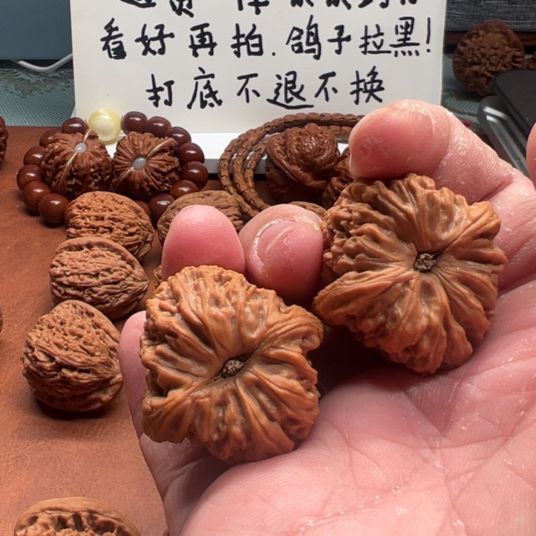 文玩核桃吊坠恍**?文玩核桃南疆石狮子头