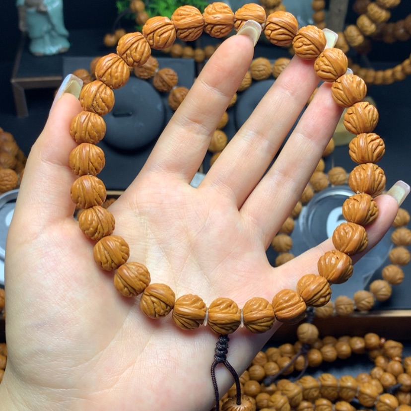 【闪购商品】桃核手串风**生火麒麟12手持