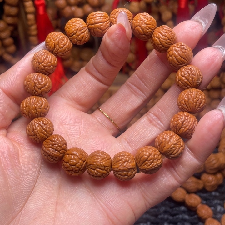 *****木质类龙纹桃枭手串