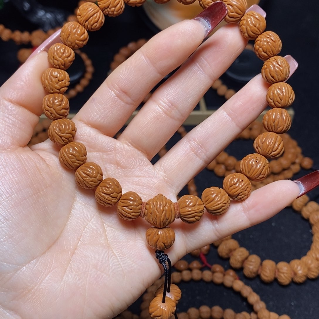 那***开桃核吊坠秦岭文玩