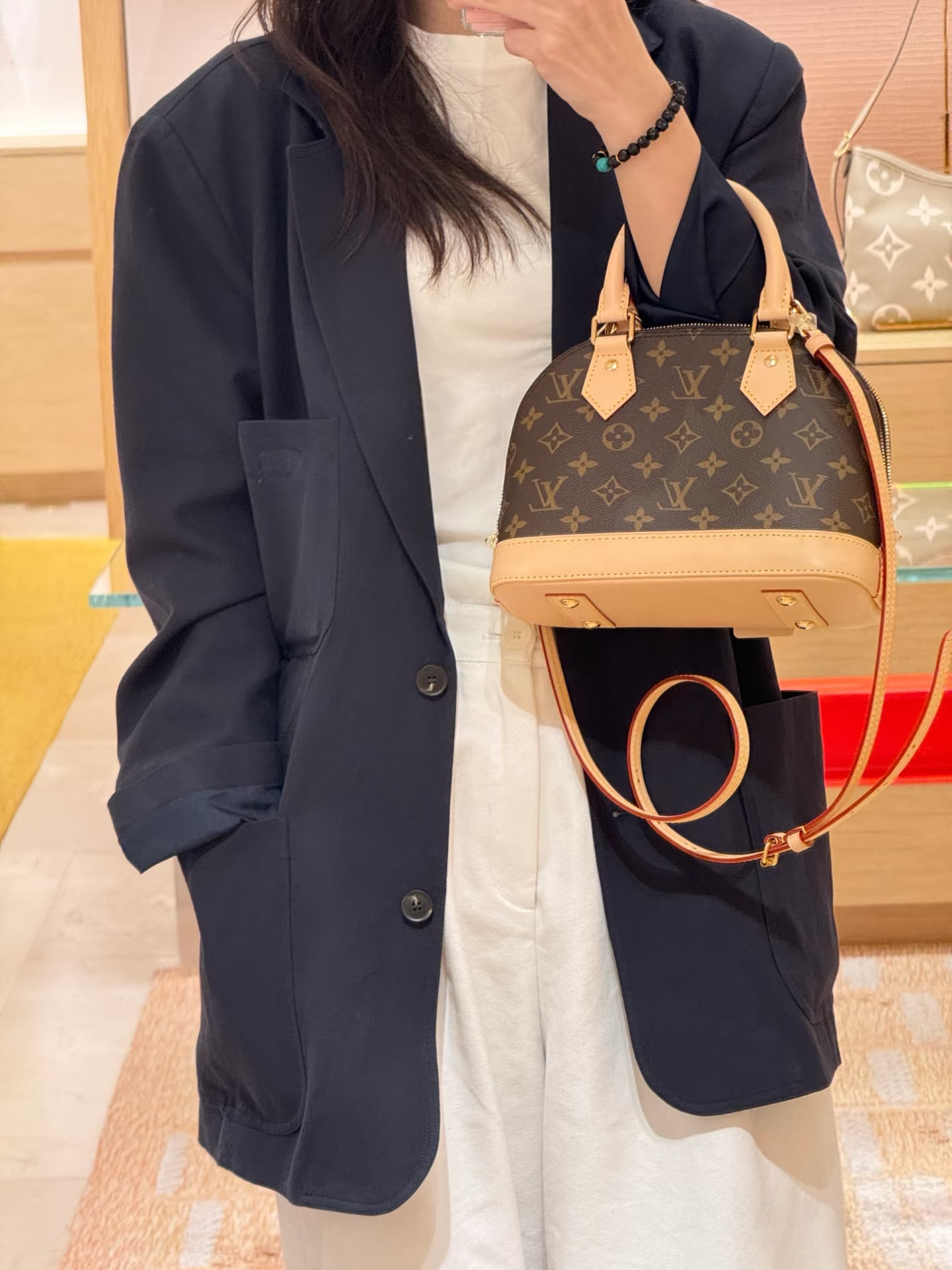 修复品LouisVuitton/路易威登中古款贝壳bb手提包后换植鞣革新
