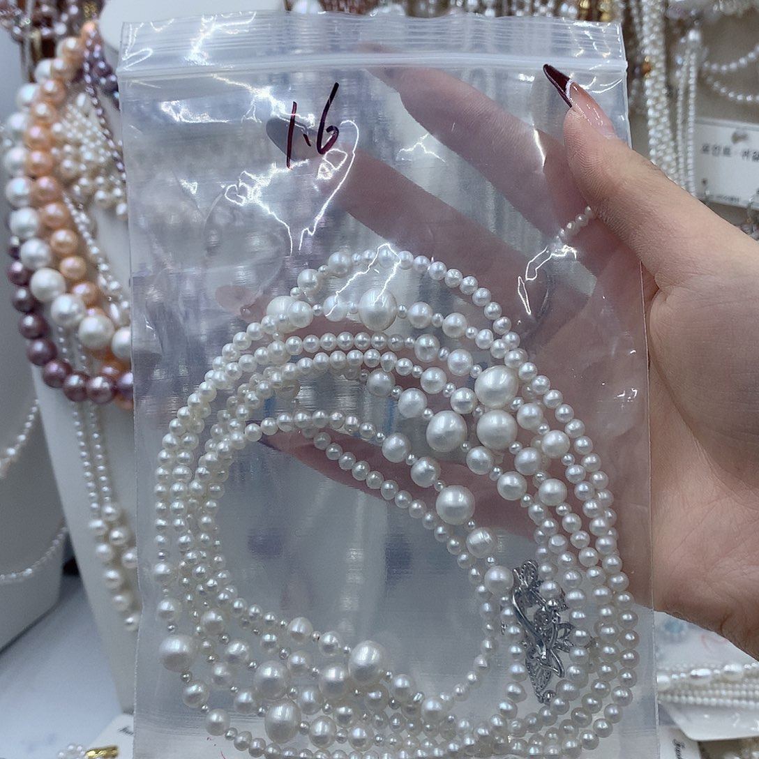 带****淡水珍珠银S925镶嵌耳饰