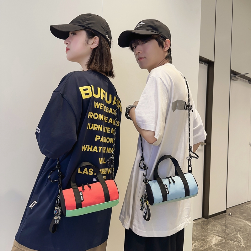 拼色圆筒包包女2025新款手提小背包时尚通勤运动斜挎包百搭单肩包