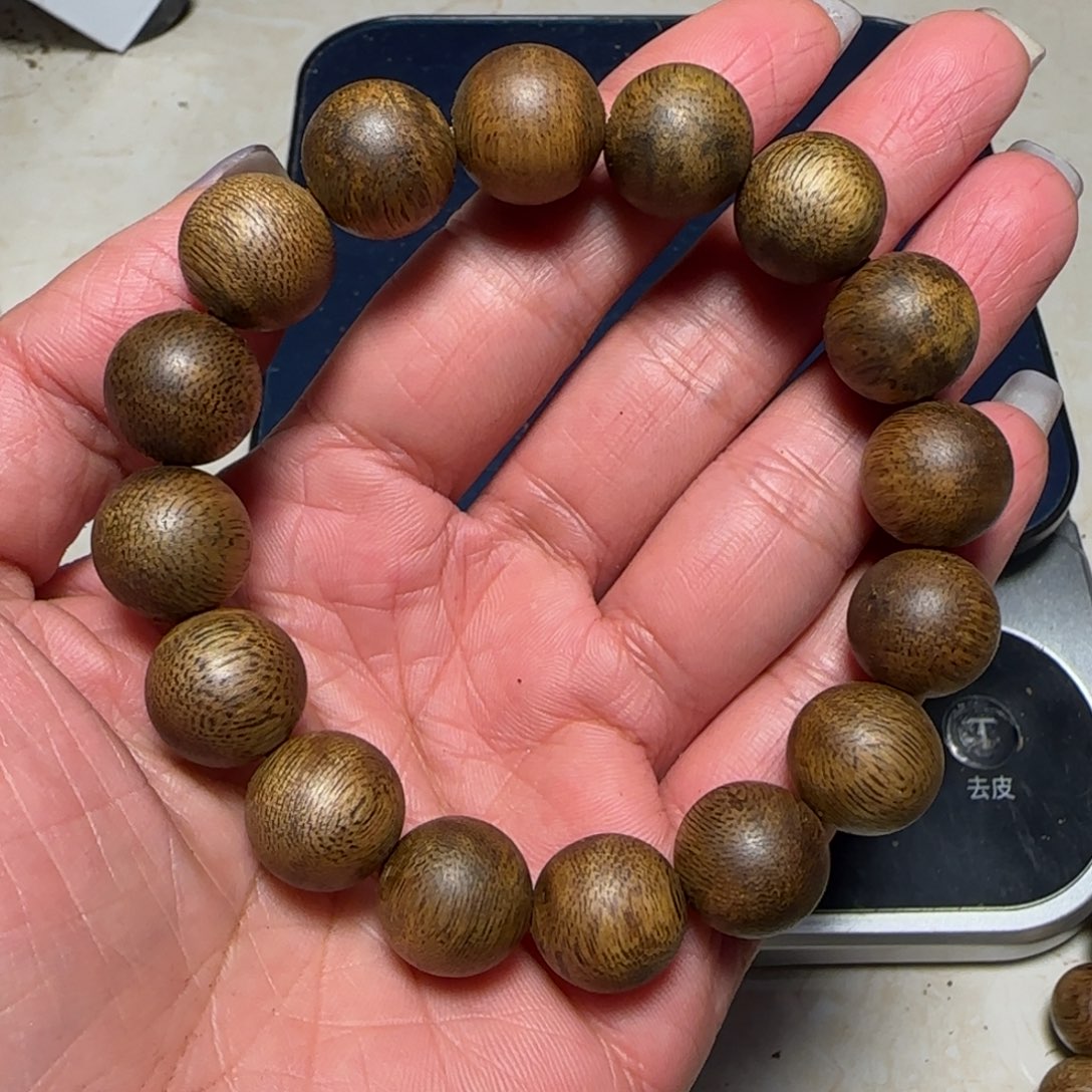 竹奇楠卡1.4单圈13.2克。