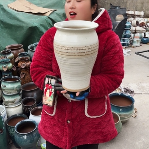 口20高32瑕疵盆子。  