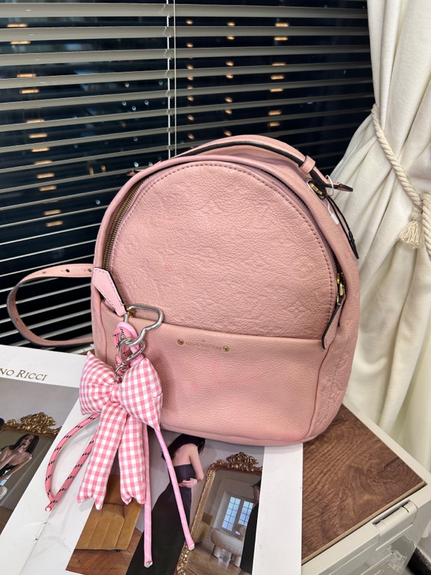 95新 LouisVuitton/路易威登 时尚粉色双肩包休闲百搭背包
