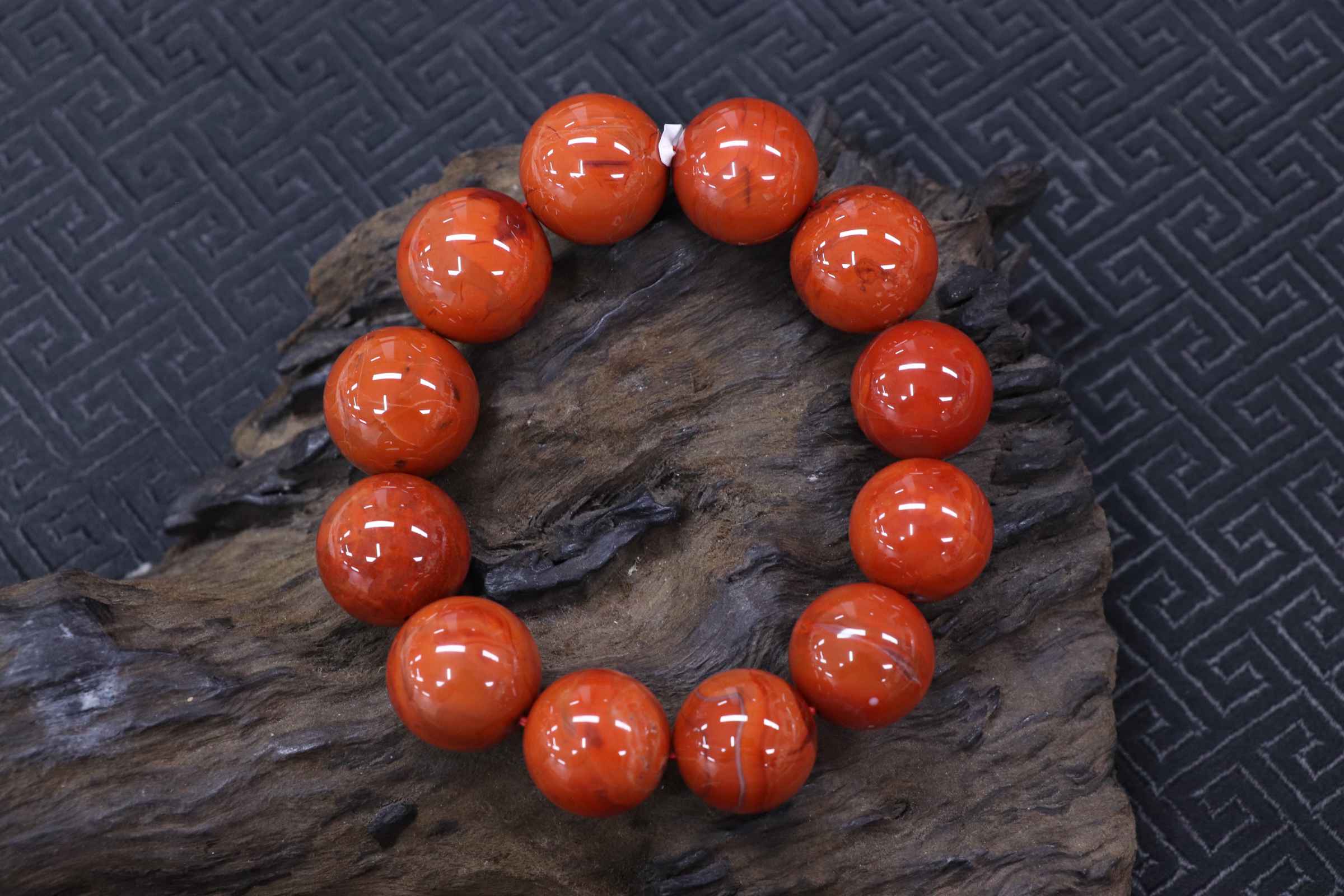 原矿无优化天然南红川料柿子红火焰纹单圈16-17mm左右