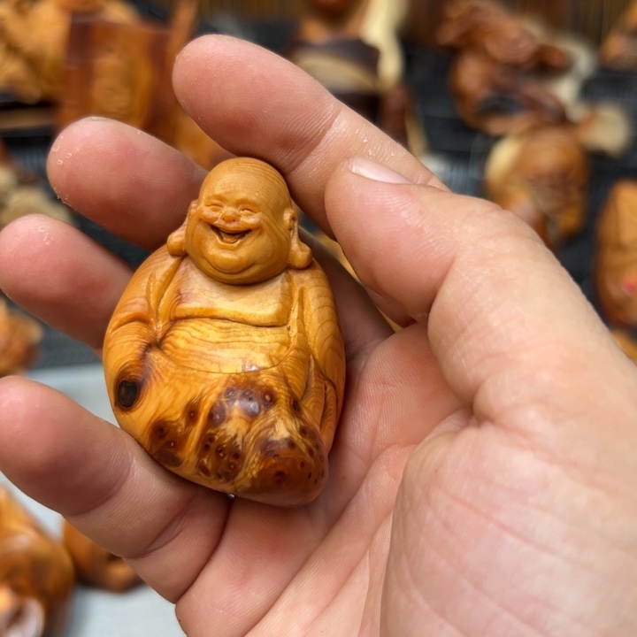 鸿***头柏木手把件的设计和制作