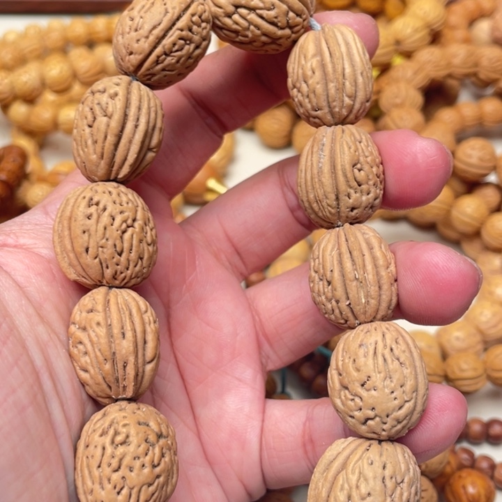 凡***子桃核手串原皮钱袋子
