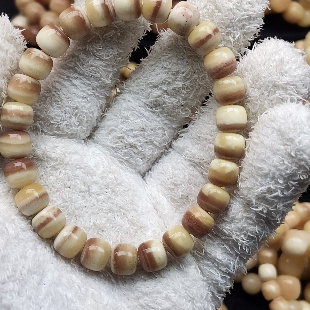 焦***托驼骨手串/手链三花