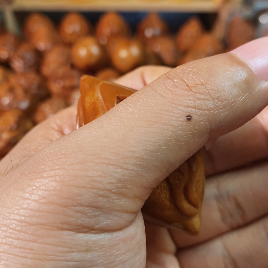 橄榄核把件三面生命