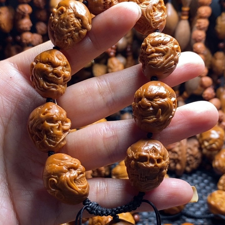 橄榄核吊坠向死而生