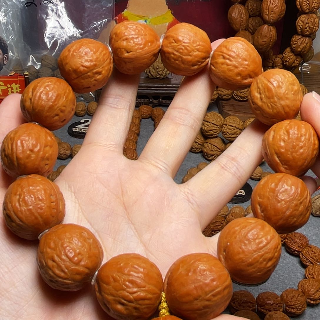 核桃红皮光头手持88