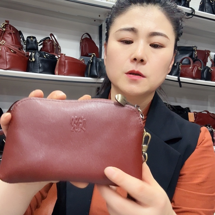 忻***忻头层牛皮10952棕色微瑕