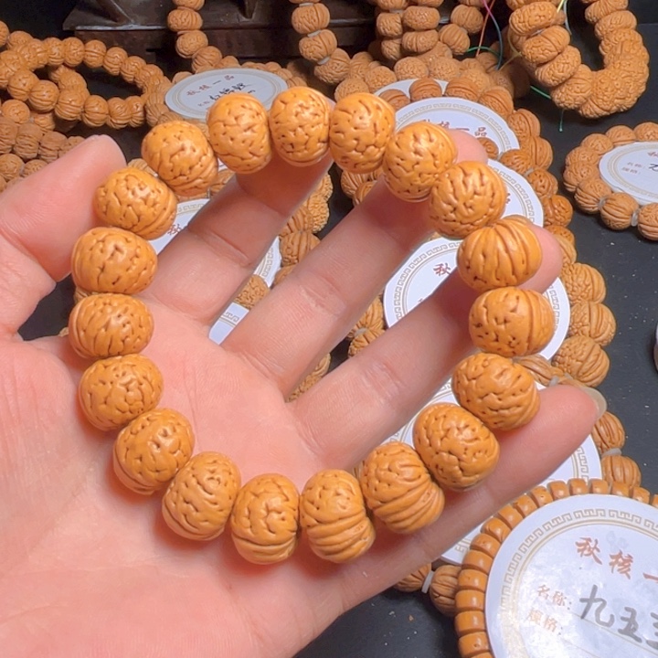 桃核吊坠好****）树王纽扣